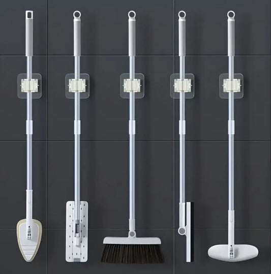 مشبك تثبيت للممسحة / أدوات التنظيف Support mural pour balai / serpillière Mop & Broom Holder Clip